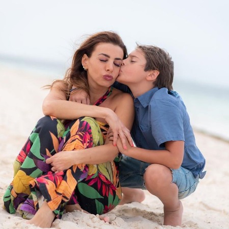 Susy Lu with her son Luca de la Torre at the beach. 